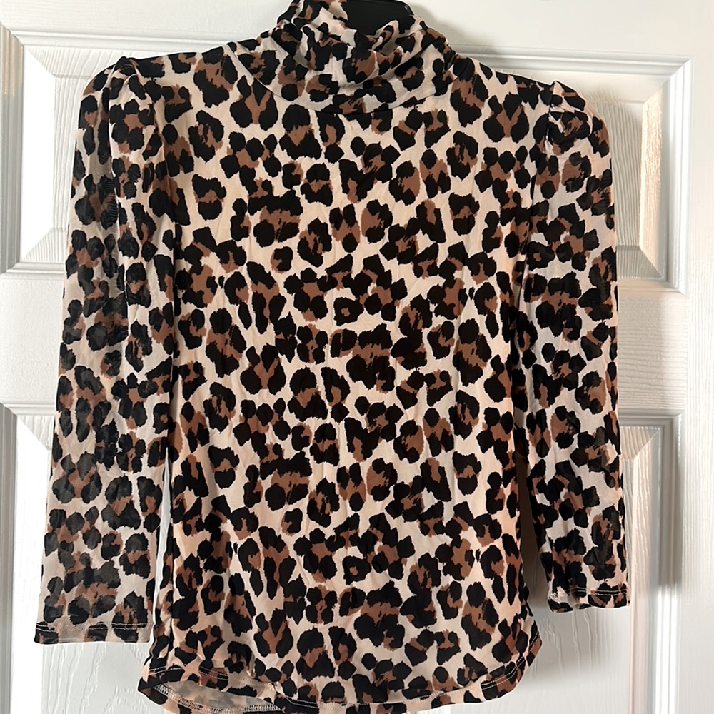 Semi sheer Free People leopard print turtleneck.